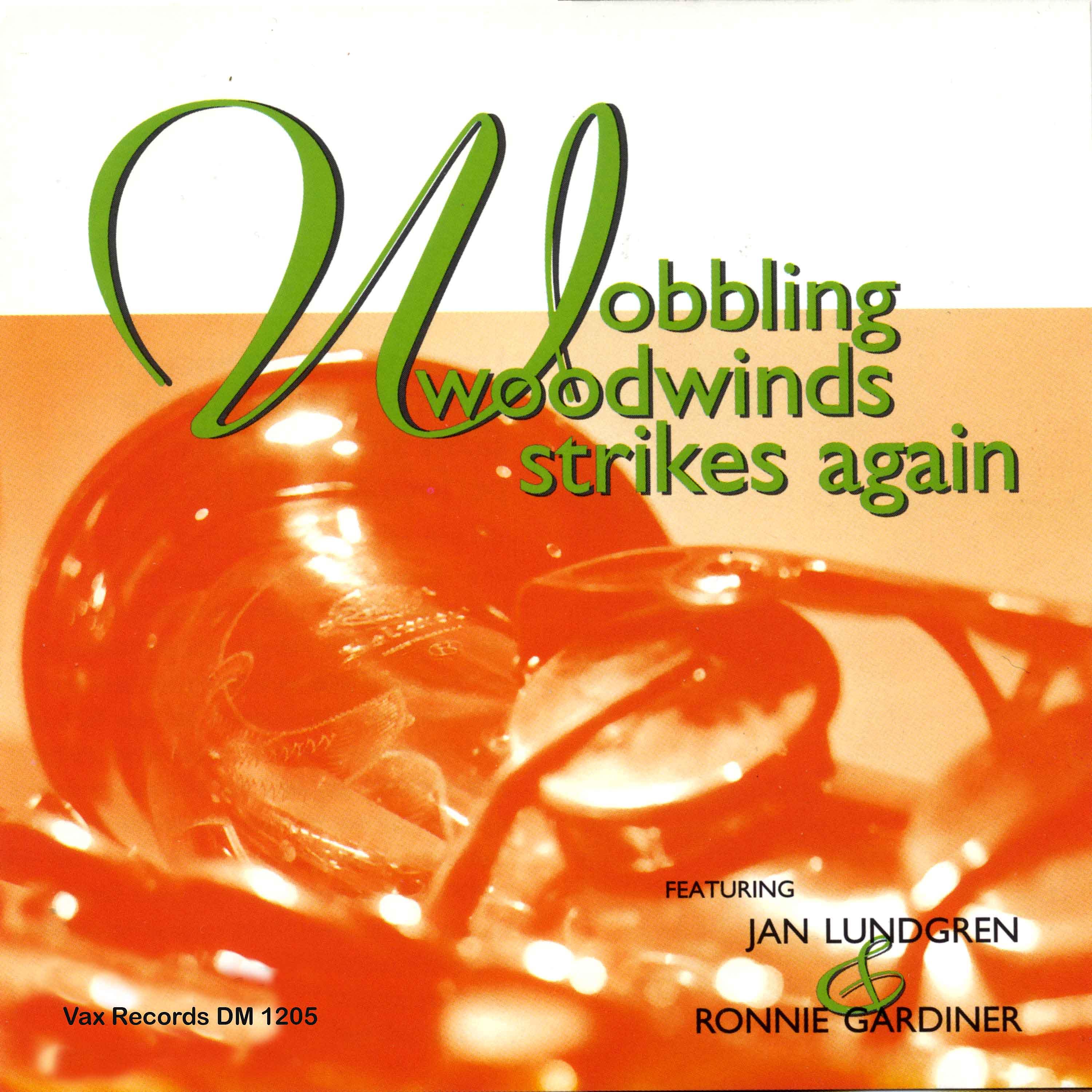 Постер альбома Wobbling Woodwinds Strikes Again