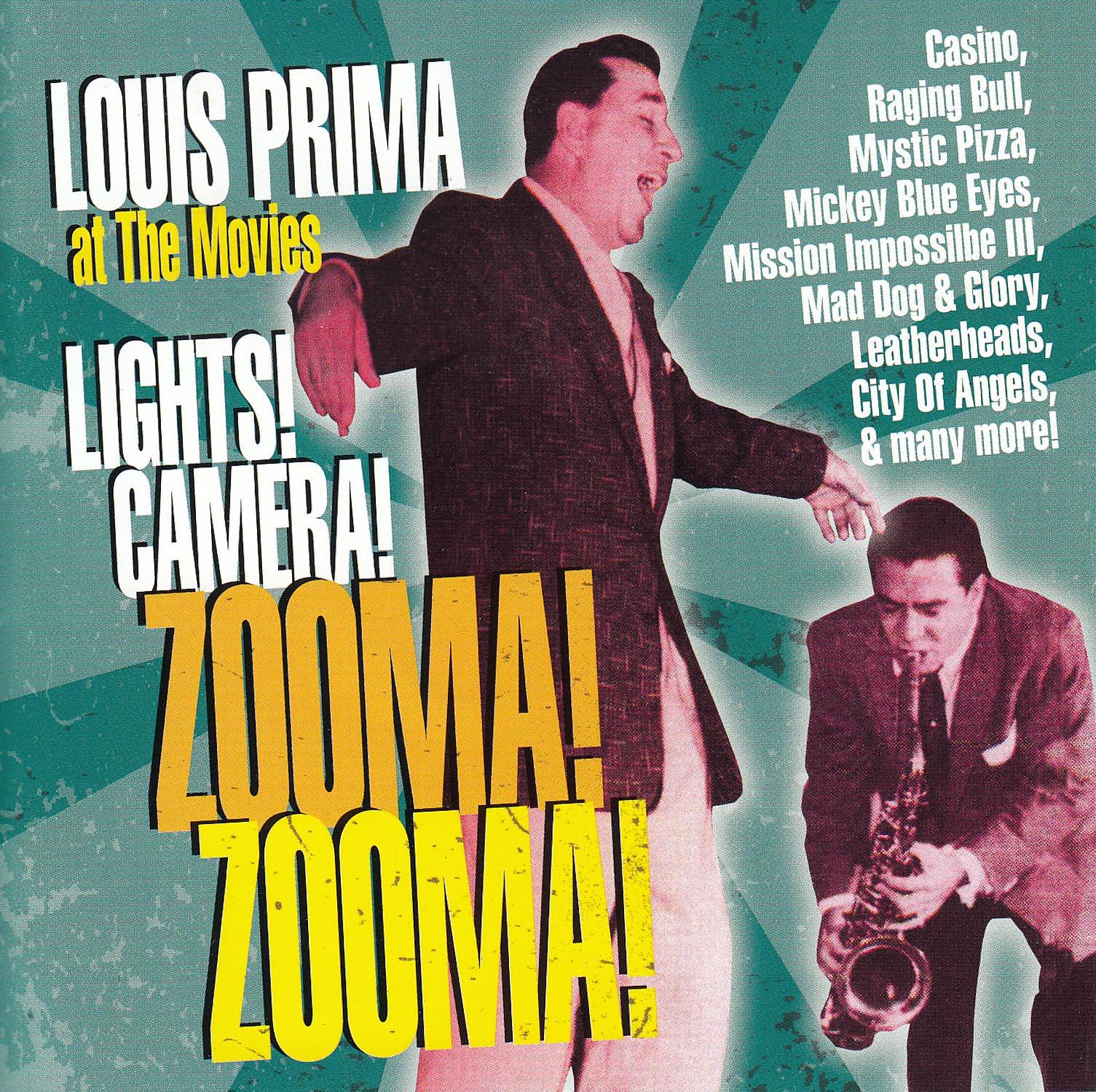 Постер альбома At the Movies: Lights! Camera! Zooma! Zooma!